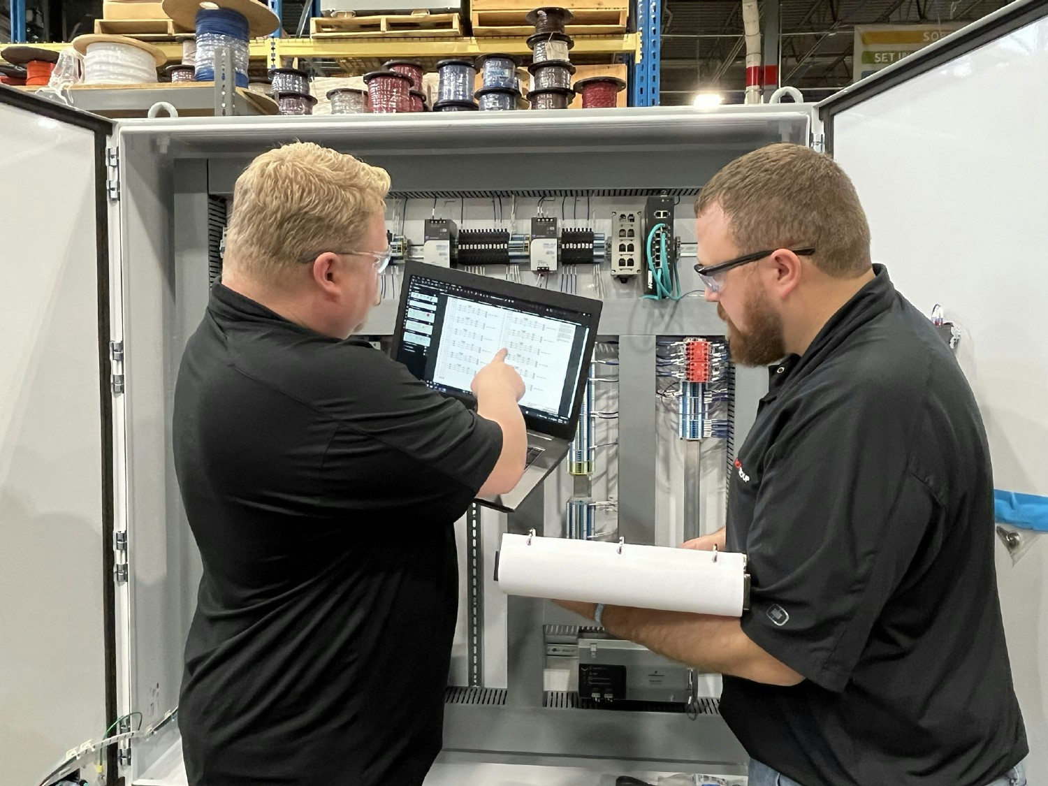 Control panel review between the design team leader and the build team leader. 