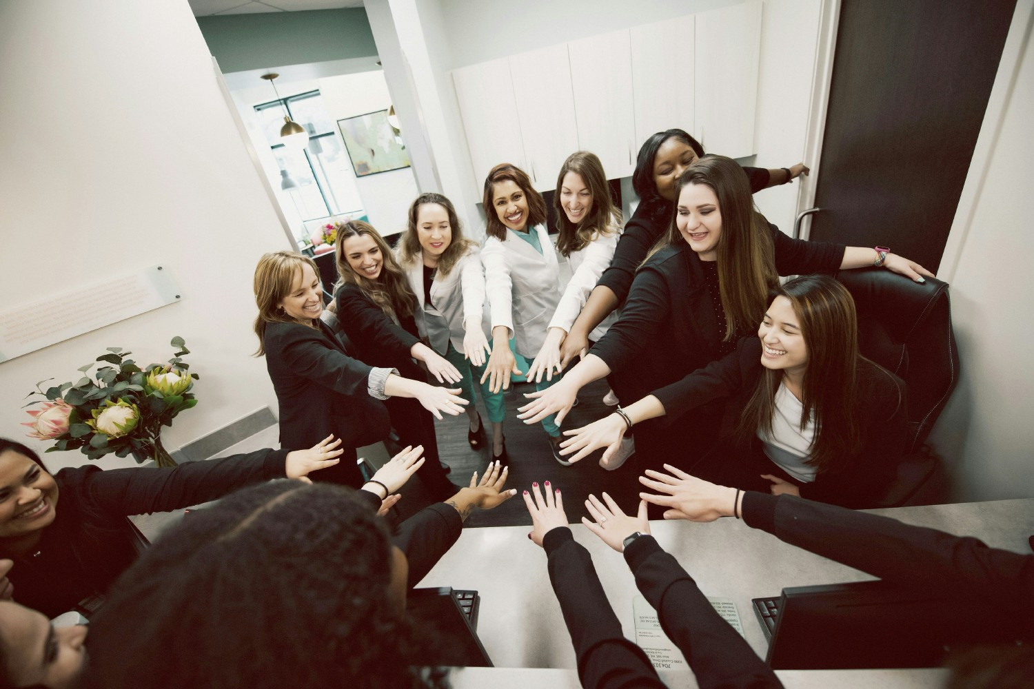 We have a team huddle every day that starts with a fun and engaging activity, and ends with a team cheer!
