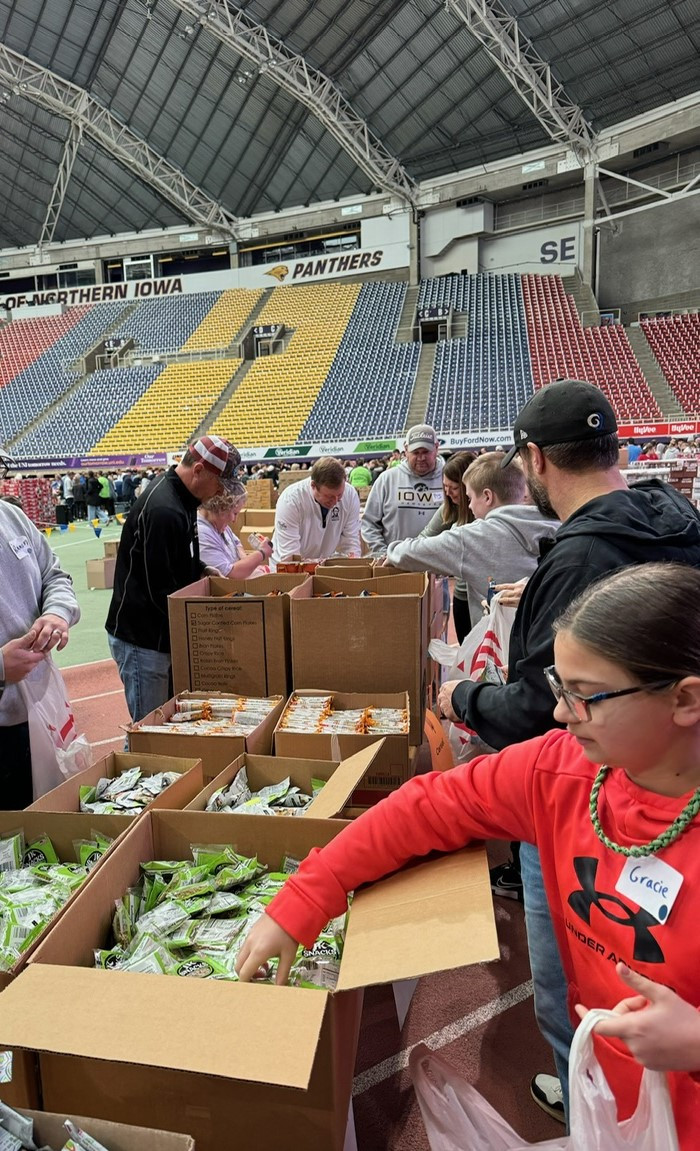 LSB teammates and friends packing over 75,000 bags for the Northeast Iowa Food Bank's BackPack Program!