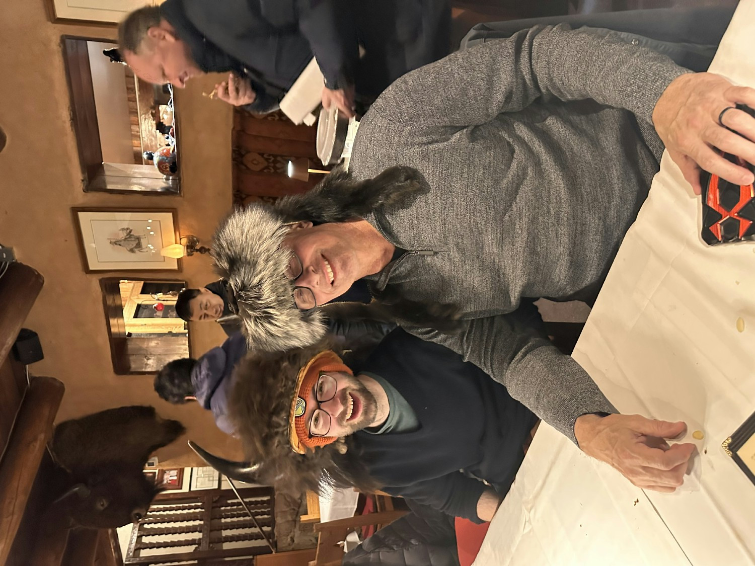 Astrica Engagement Lead and client having fun at dinner in Denver, Colorado after a day of work.