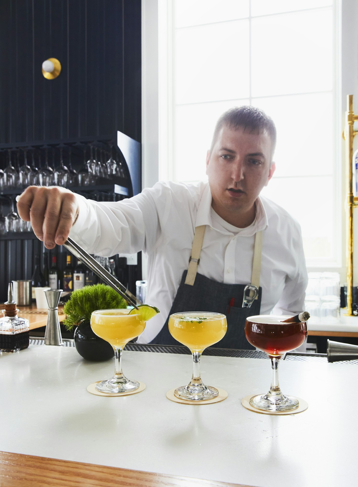 Crafting cocktails with precision—each drink a work of art at the bar.