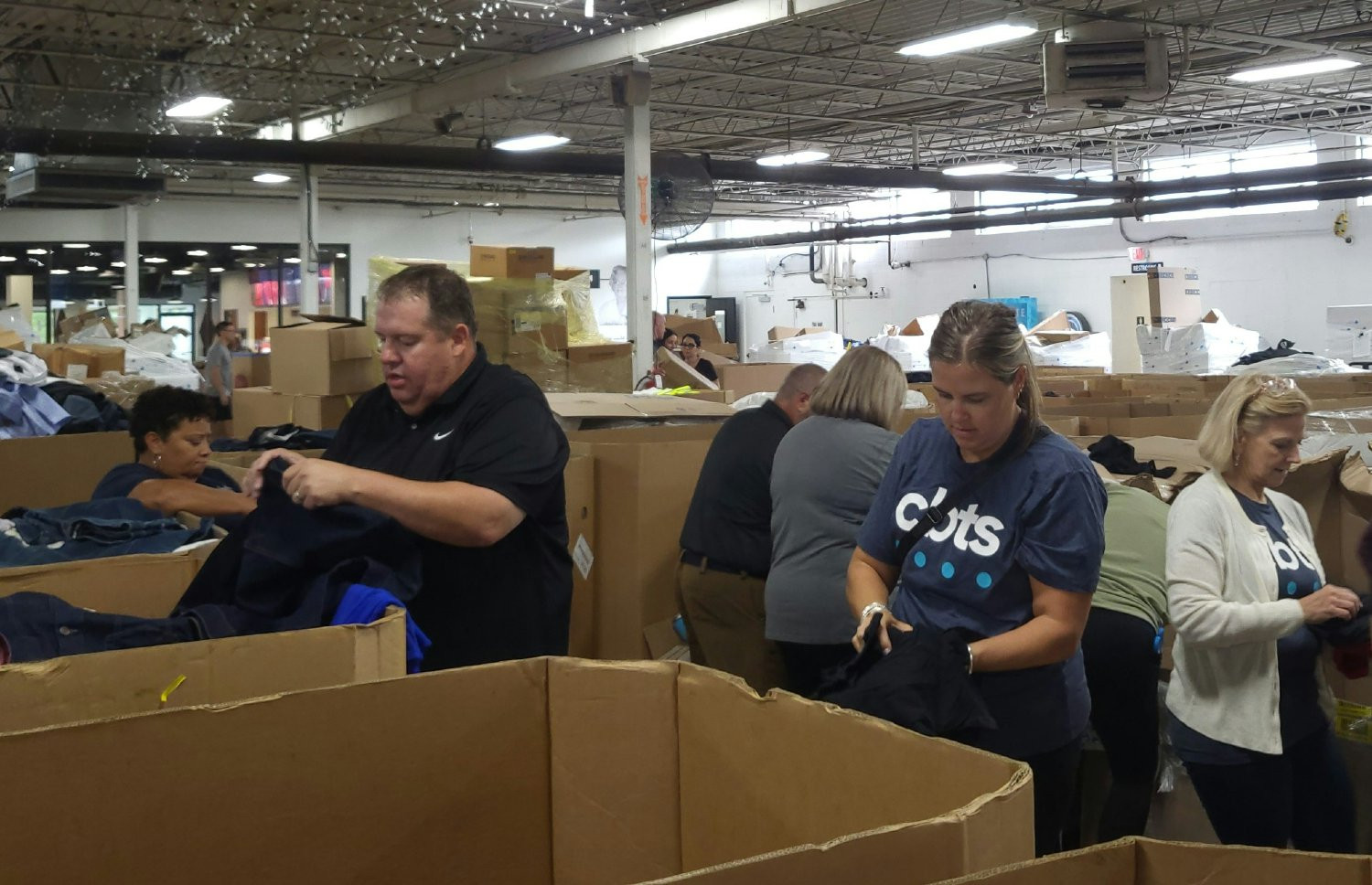 Various ERG members volunteered at Matthew 25: Ministries to help sort clothing for those affected by natural disaster
