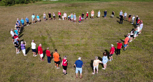 Team members and residents formed a heart to represent inclusion and caring at our communities. 