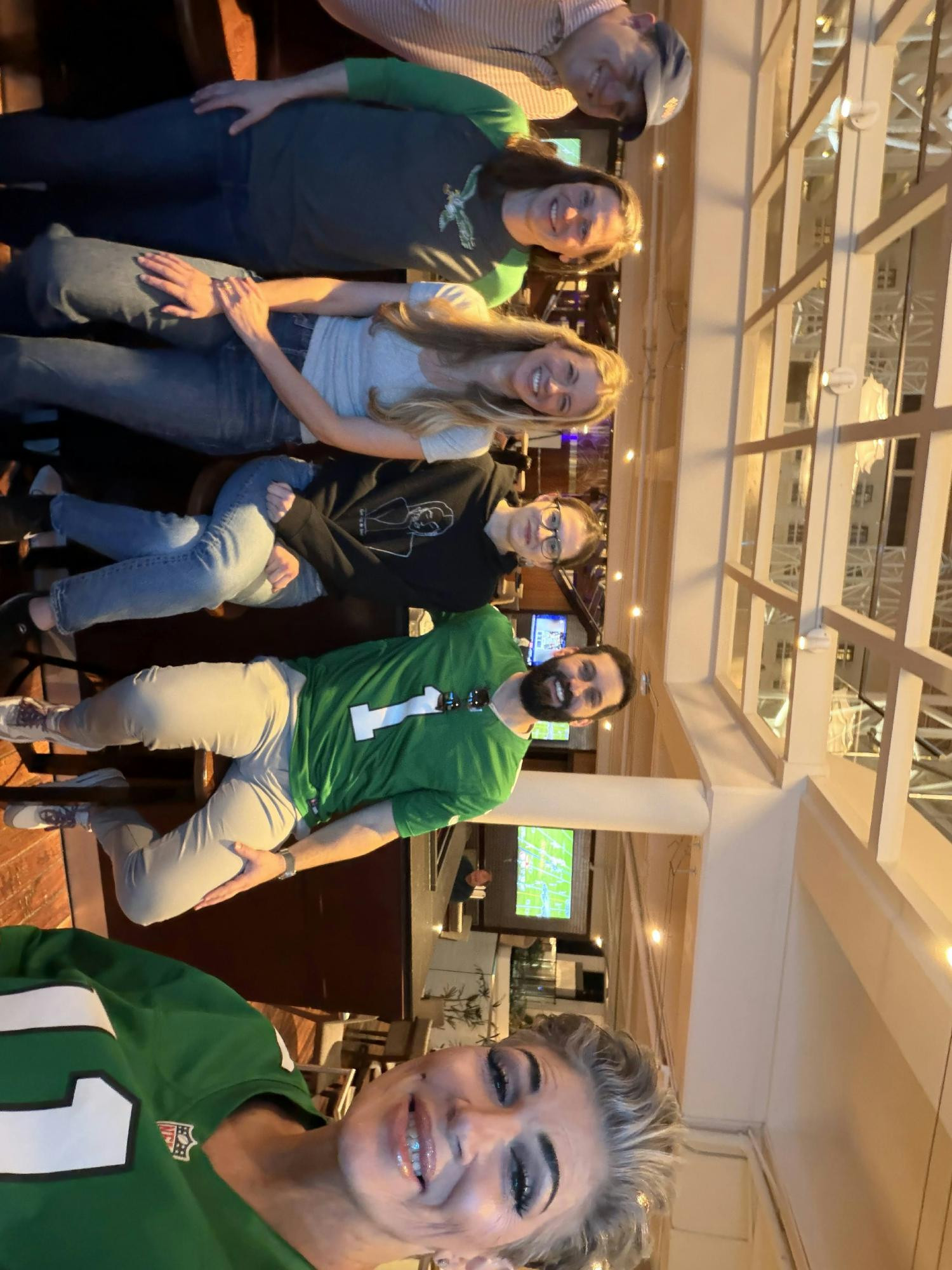 Colleagues from across the company met up in person, jerseys on, ready to cheer together.