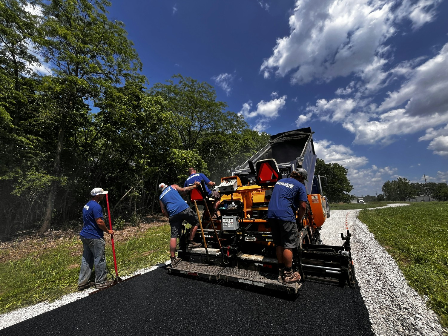 Our crew paving new pathways for community residents to walk, run and cycle through our beautiful metro parks.