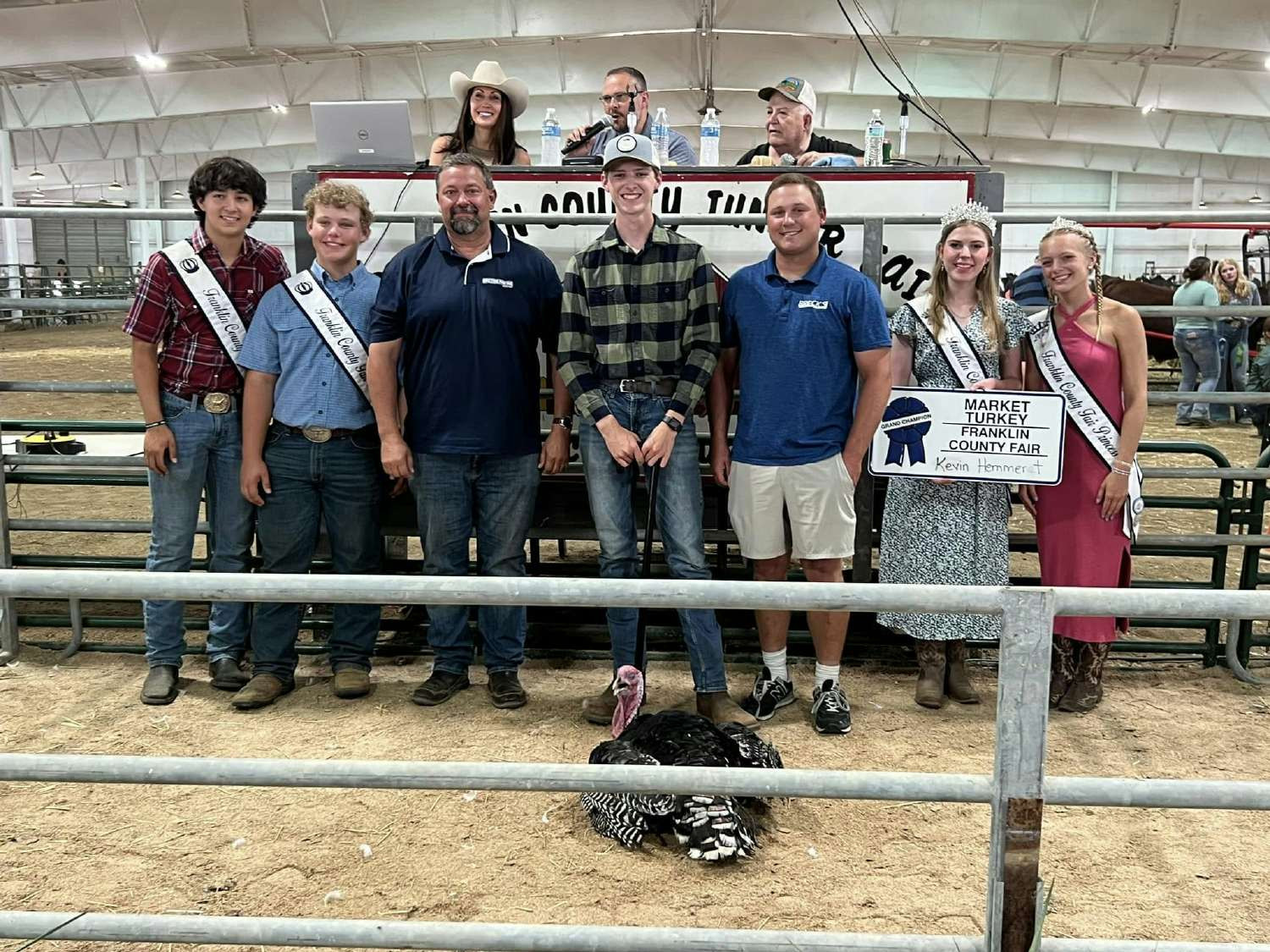 Our owner proudly standing with the Grand Champion turkey Breck's Paving purchased to help support our local 4-H.