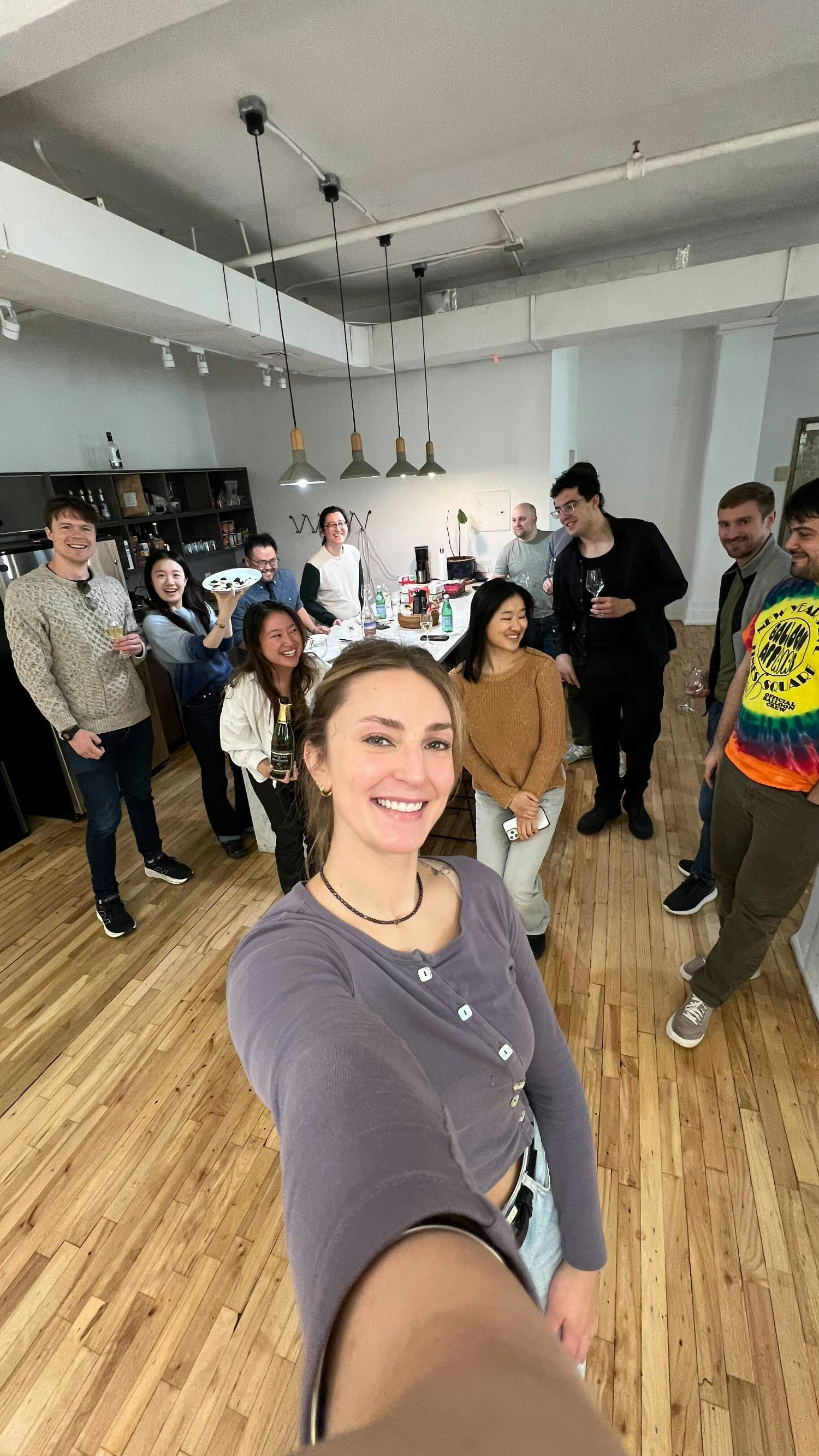 Happy Women's History Month! The team gathers for champagne and caviar toasts. 