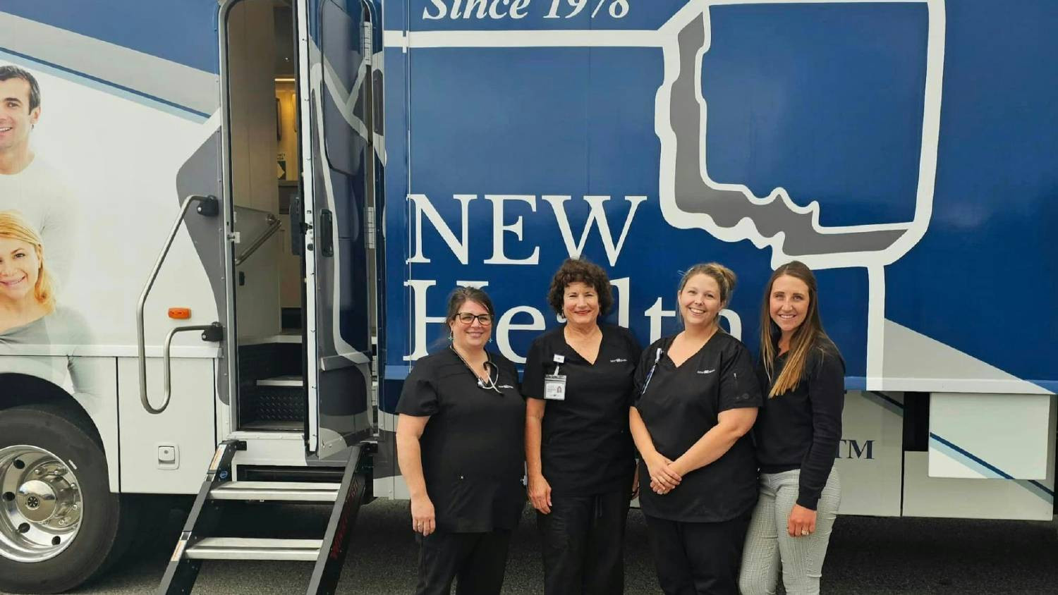 Excited NEW Health Medical support team prepping to hit the road in the mobile unit for back-to-school events.