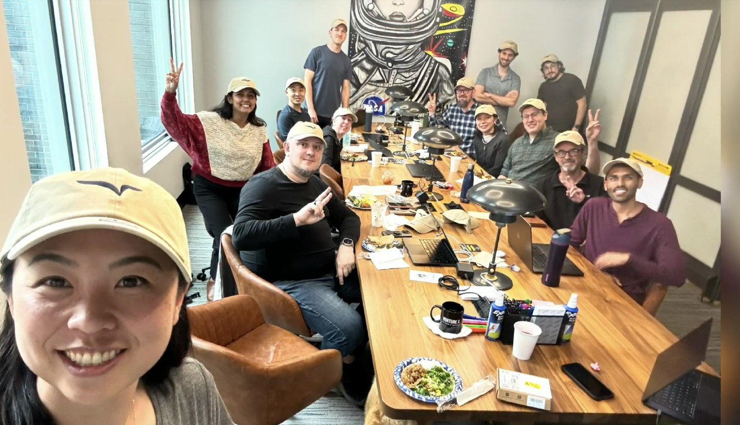 Team offsite in Denver with Freedos showing off their new Freed Swag!