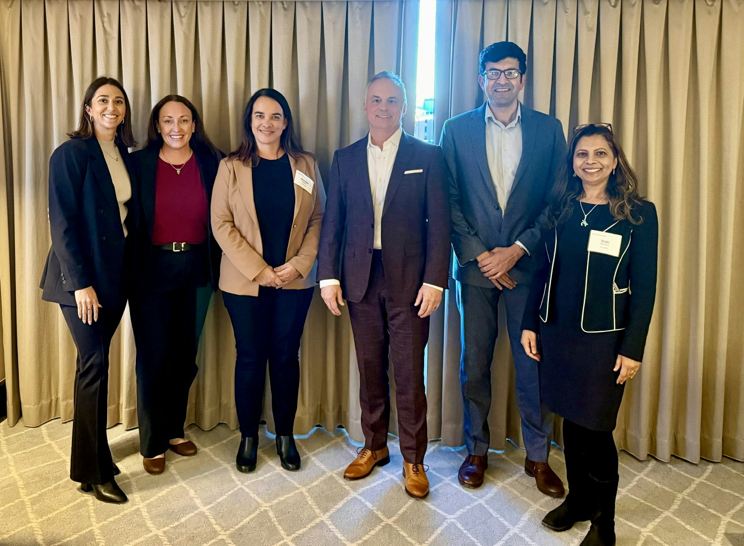 Members of the Zura team at a conference
