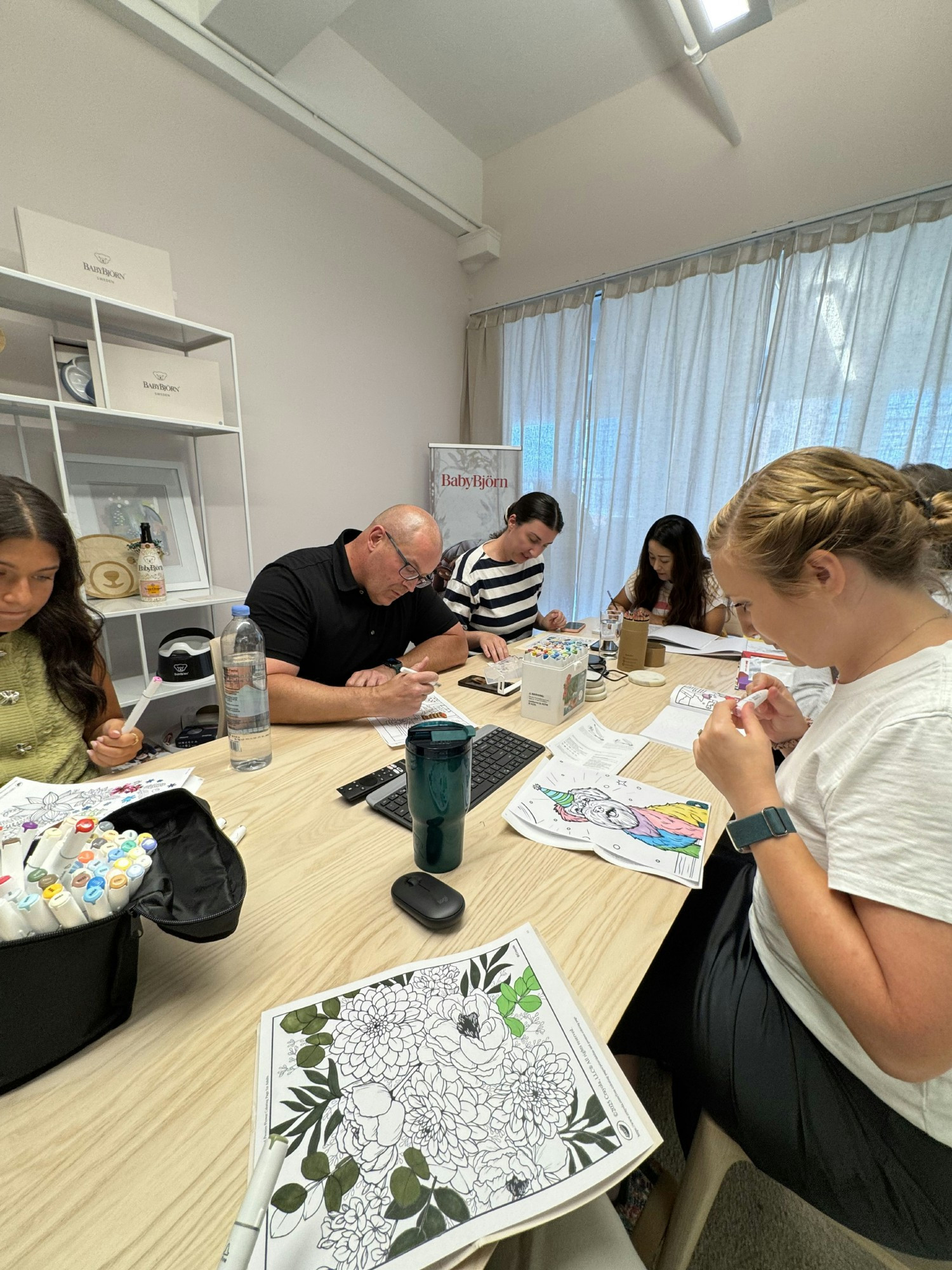 We started a coloring book club—a simple way to unplug and connect as a team.