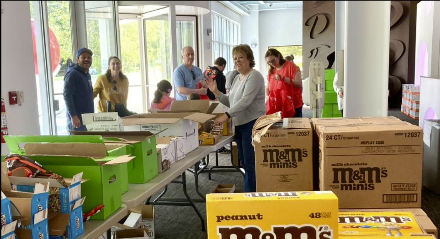 2025 Hackettstown Rotary Event, JDC Power Systems employees helped pack boxes & bags at M&M Mars prior to Car Show