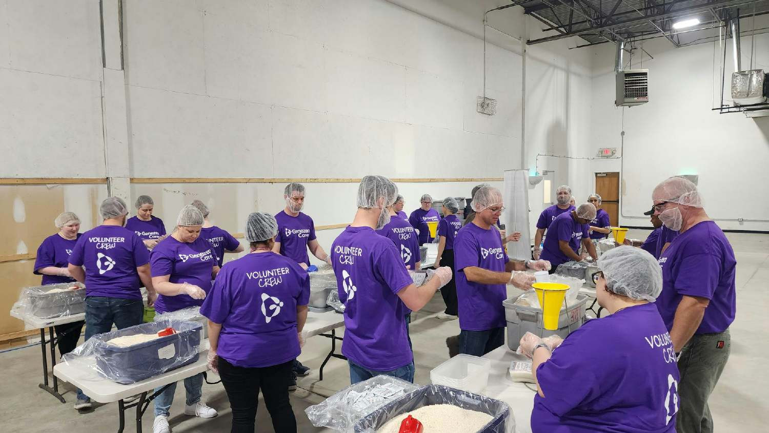 Our Indy team packing meals for Rise Against Hunger. 