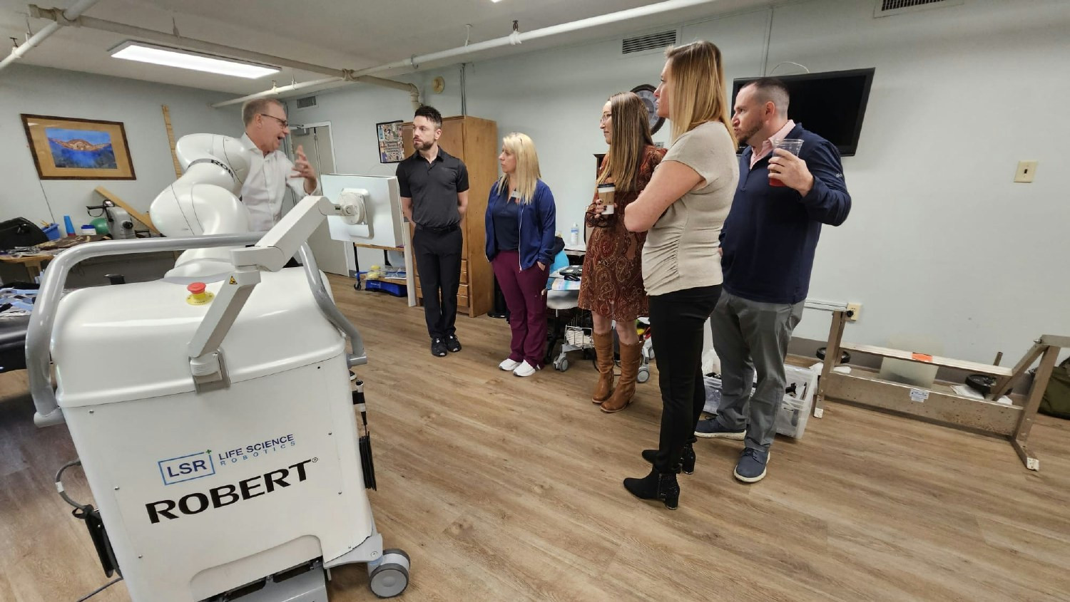 Our clinical and corporate teams learning how ROBERT the therapy robot supports resident recovery.