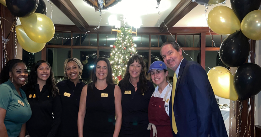 Dining Room Servers and Management ready to greet the members before the evening festivities begin.