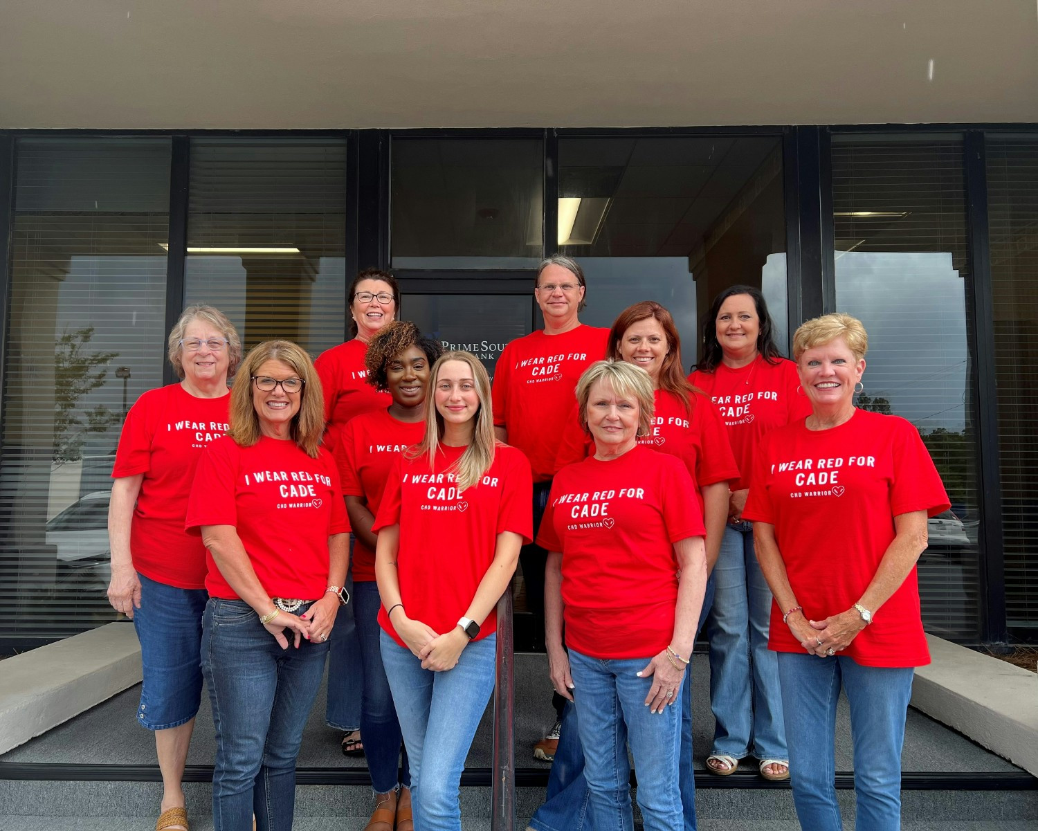 Our team wearing red in support of an employee's grandbaby who had to have open heart surgery. We support our people.