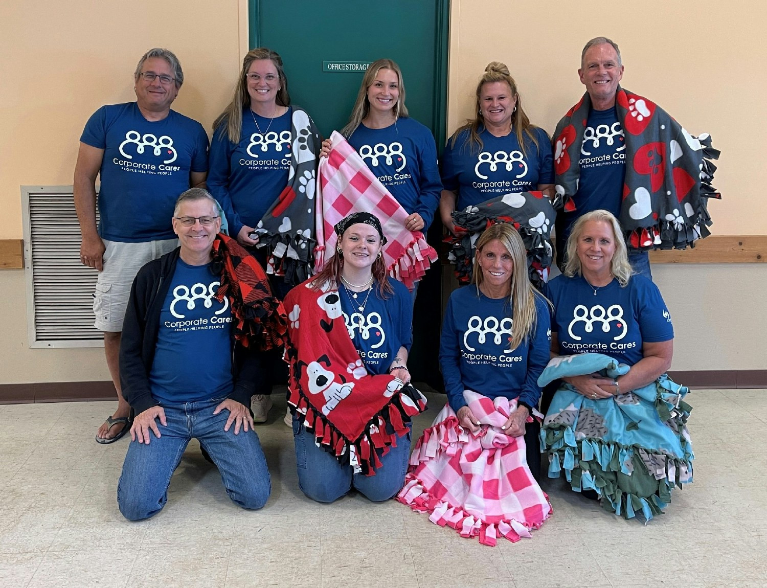 A group of employees made many blankets for the dogs housed at a local animal shelter. 