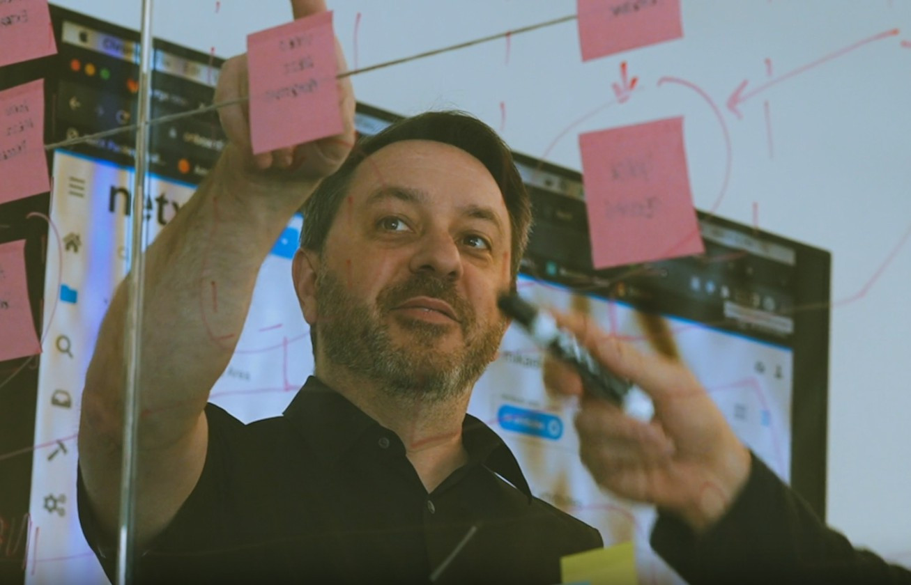 Founder Jason Wehling collaborating with the team of developers