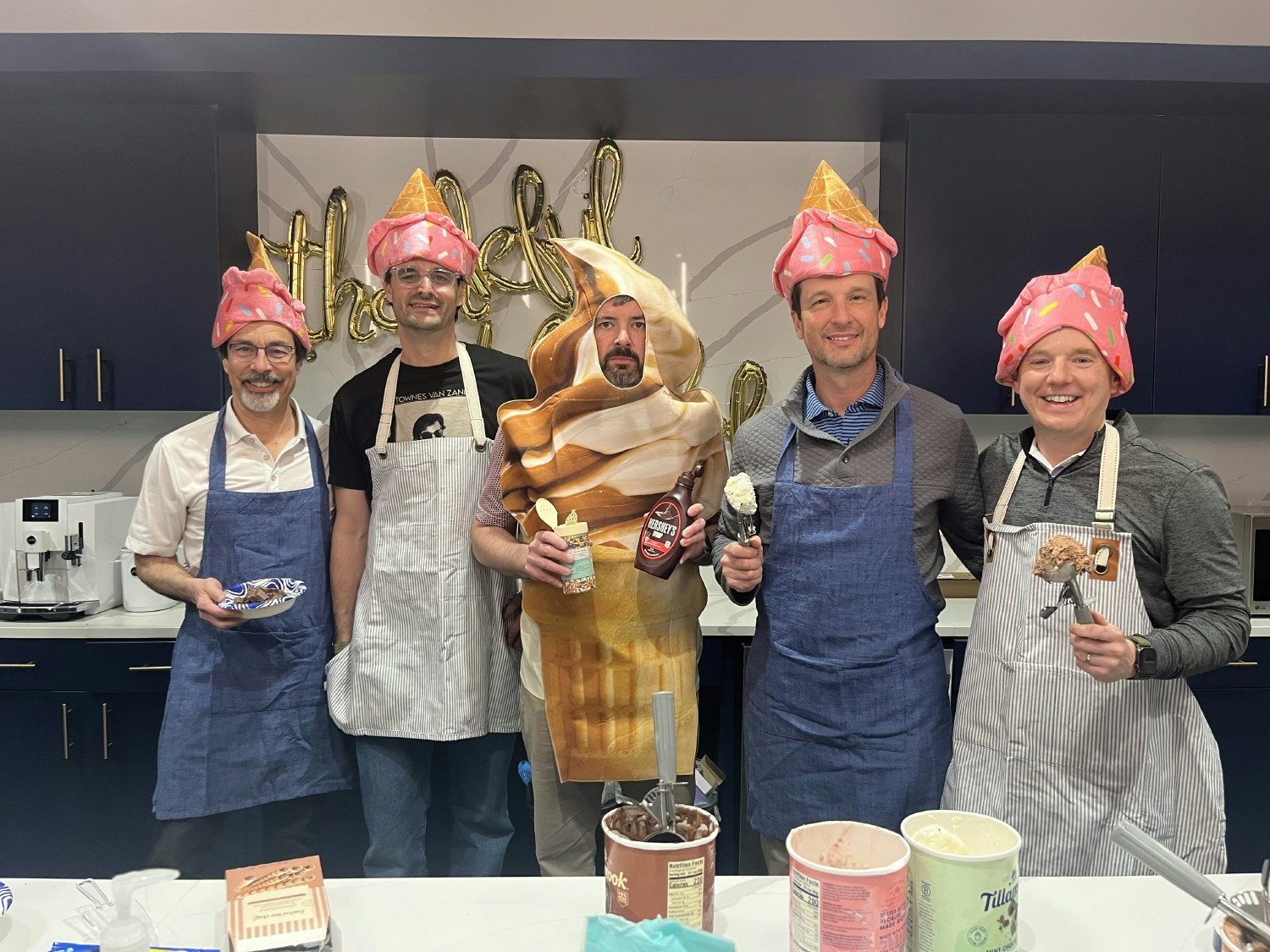 Partners rolled up their sleeves to serve ice cream sundaes to the team - a small and sweet way to say thank you