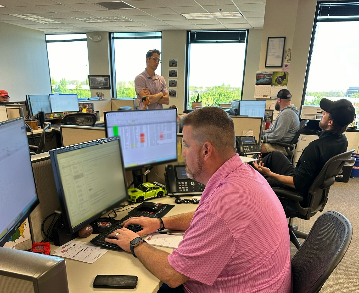 Trent Mason and a few brokerage account executives hard at work!