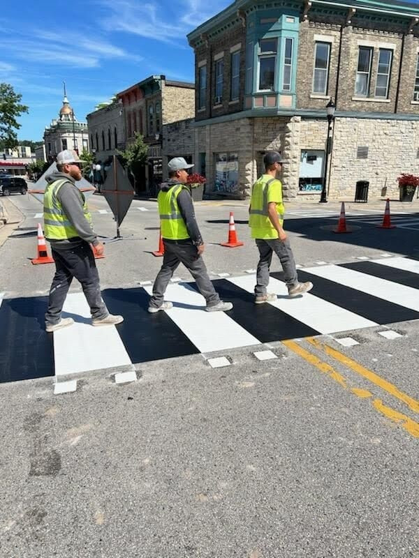 Team members channel the Beatles after installing 