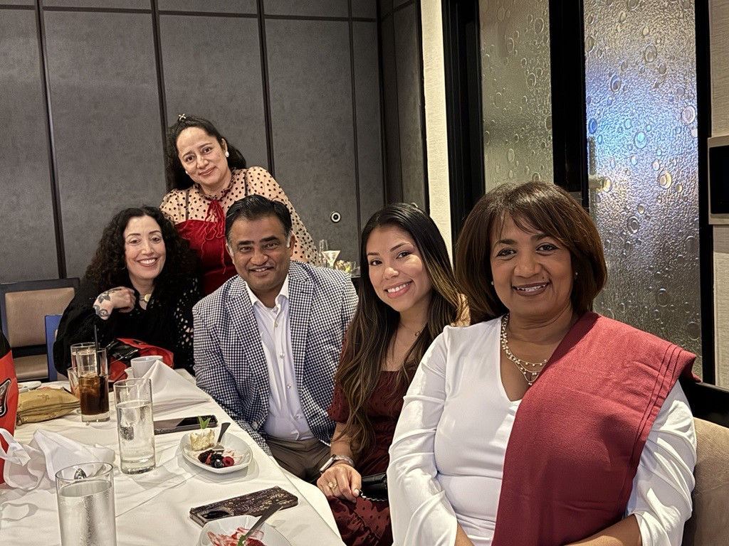 Meet our beautiful team and owner, Dr. Joshi, celebrating the close of 2024.