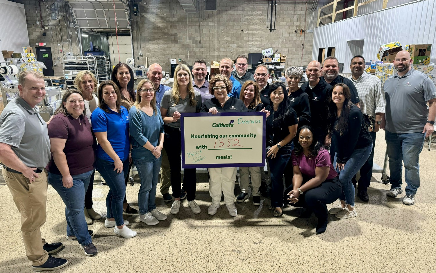 The Everwise Executive Management Team and Vice Presidents volunteering at Cultivate Food Rescue in South Bend. 