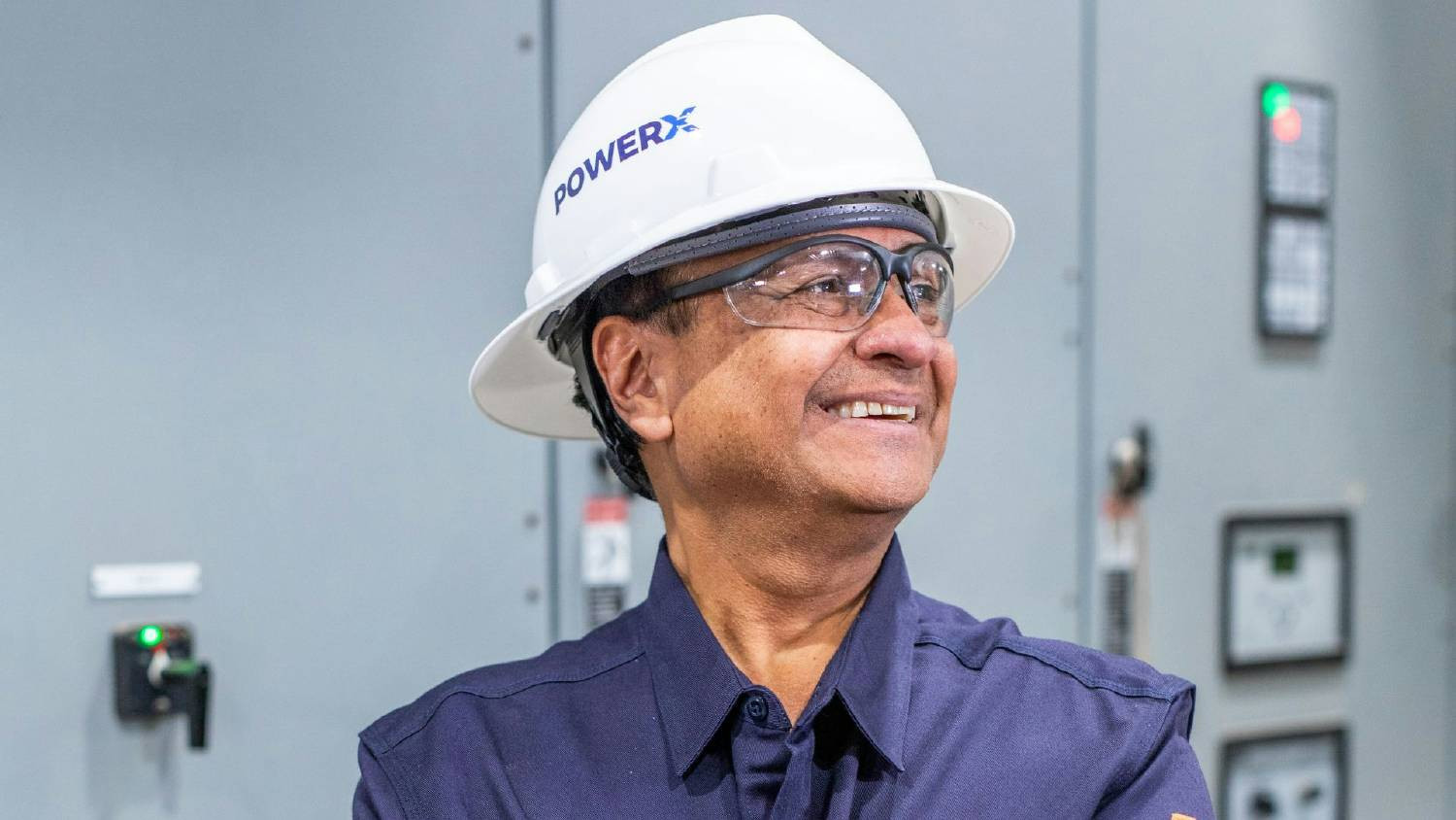 A POWERX senior professional engineer pausing for a photo at a job site.