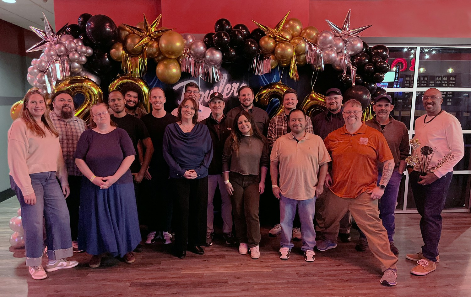 ZBeta team members hit the lanes for a bowling outing—connecting, celebrating wins, and having fun together