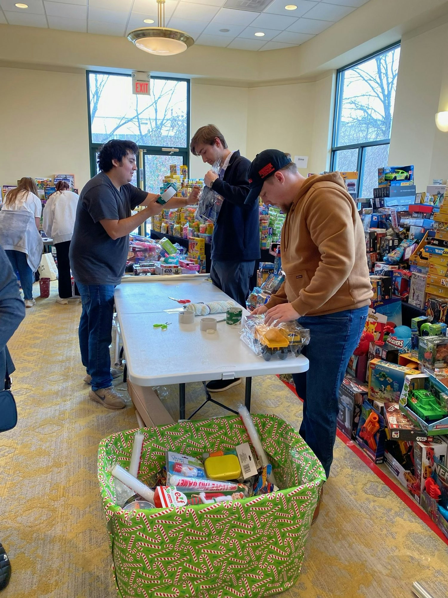 Volunteering to wrap gifts for children in need
