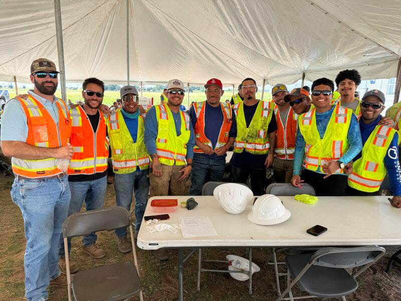 Celebrating zero incidents/zero injuries on a Construction Services project with food, fun, and laughter.