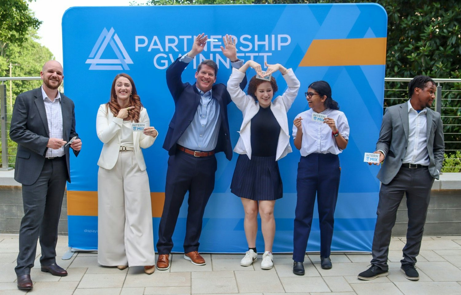 Following a record event, Gwinnett Chamber econ. dev. team pauses to celebrate results, relationships, and one another.