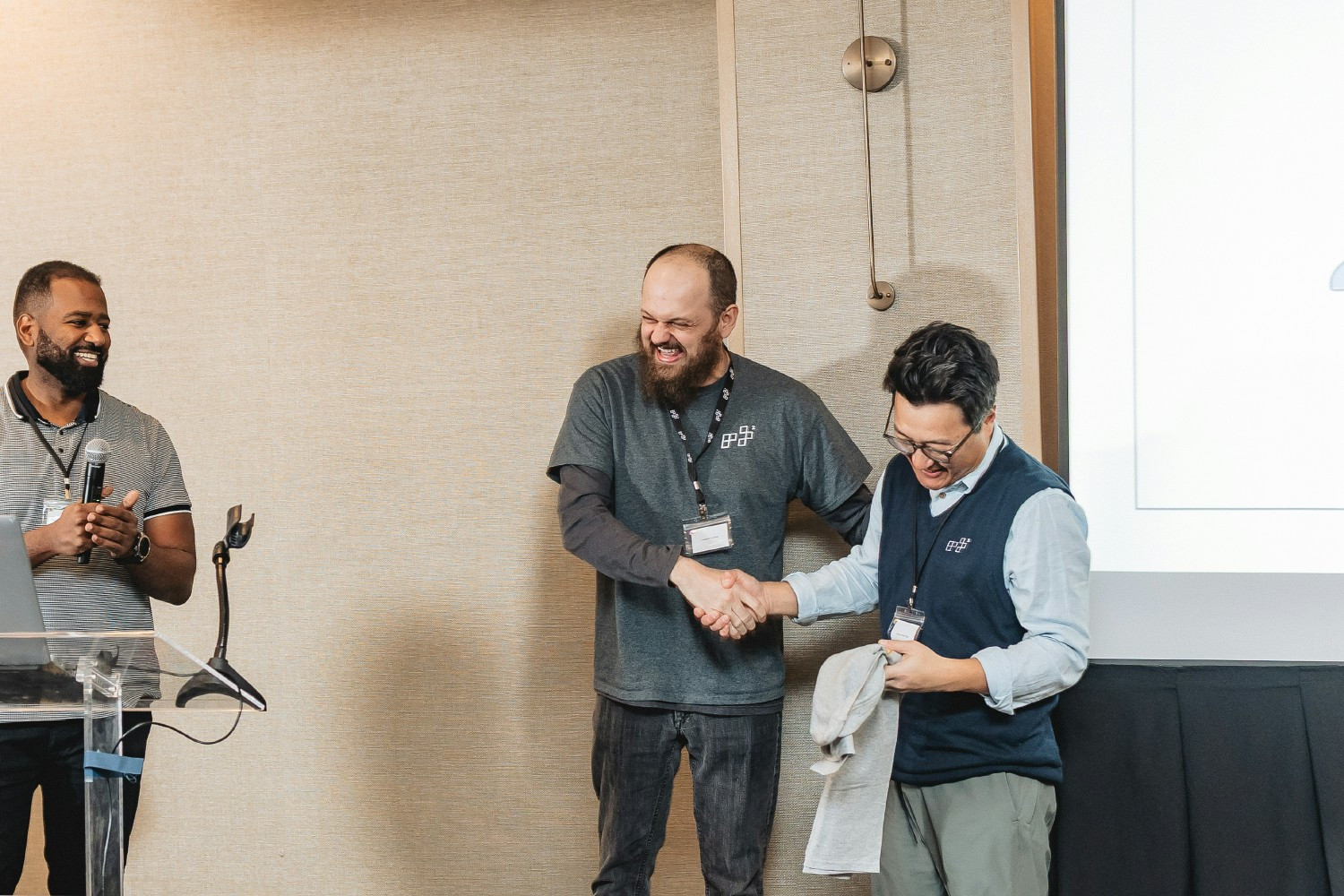 Our CEO presenting awards at our Town Hall meeting