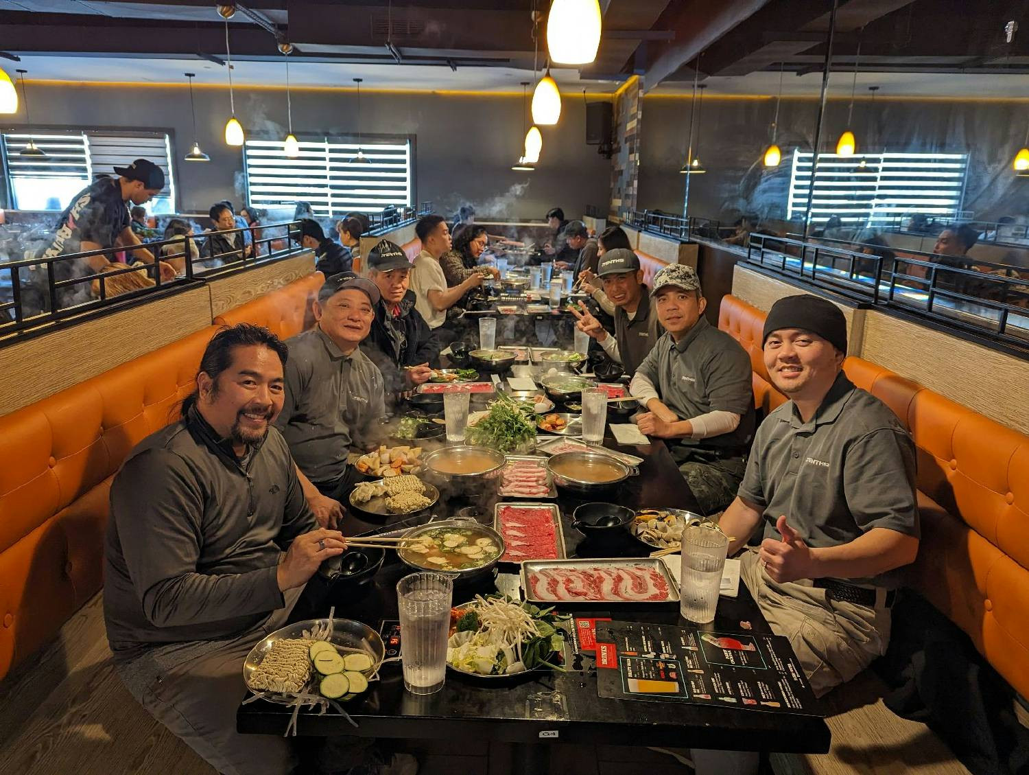 Hard work, shared reward: Our field team unwinds with Shabu-shabu.