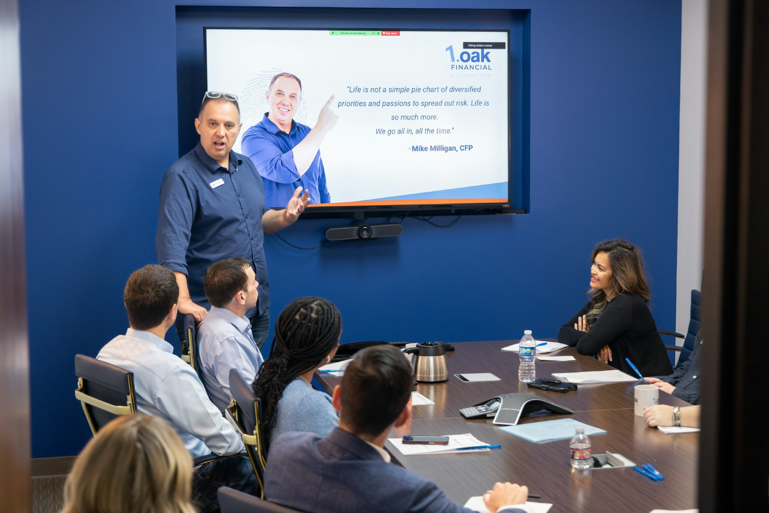Employees hearing from Founder and Chairman, Mike Milligan, CFP at the 1.oak Staff Workshop. 