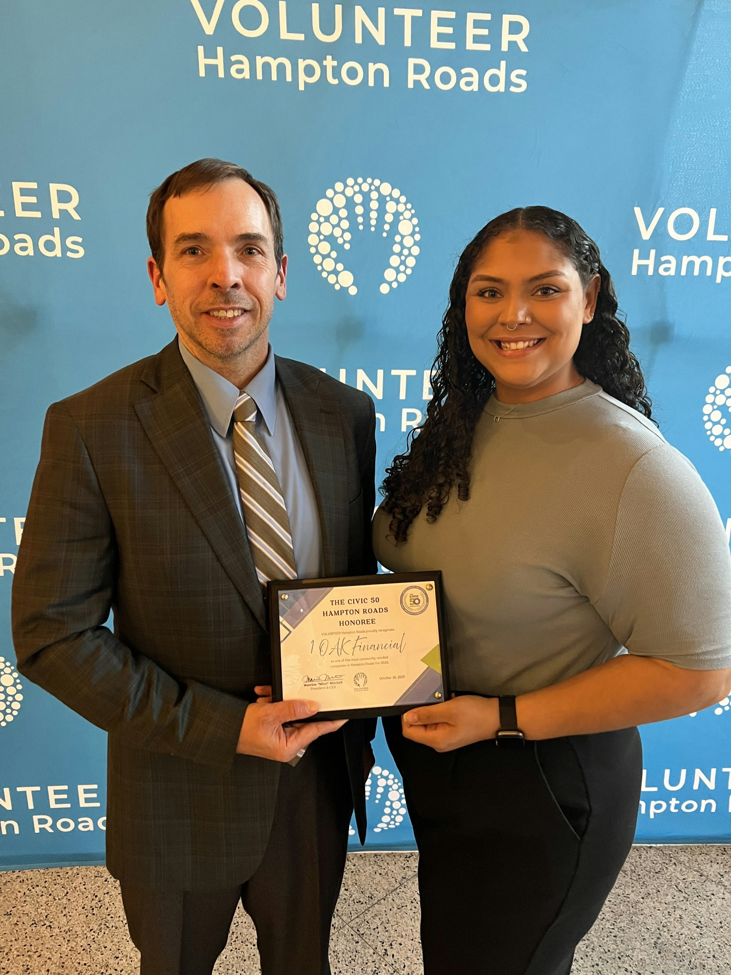 Casey & Natalia accepting the Civic 50 Hampton Roads Honoree award at Volunteer Hampton Roads annual event. 