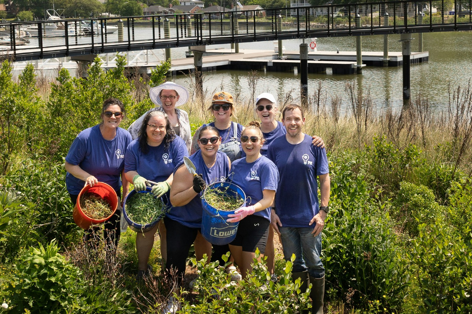 Employees of 1.oak Financial volunteering their time at the Elizabeth River Project in Norfolk, Virginia. 