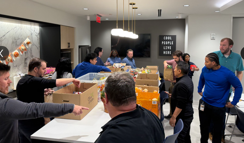 Atlanta office partners with Goodr and packed over 40 snack bags for kids and raised over 1,000 dollars