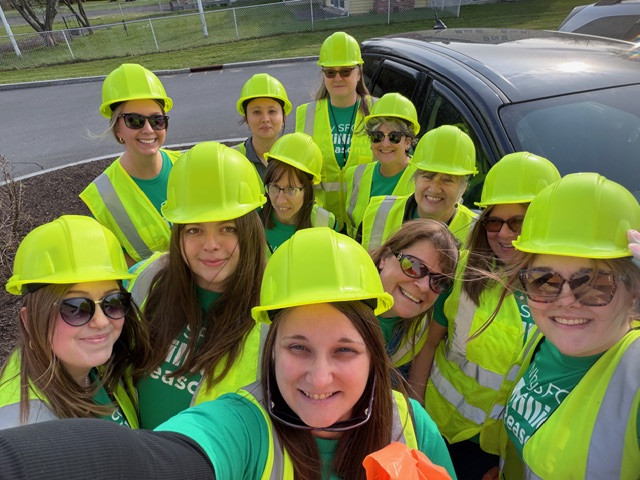Team members helping keep our neighborhoods clean and beautiful. 