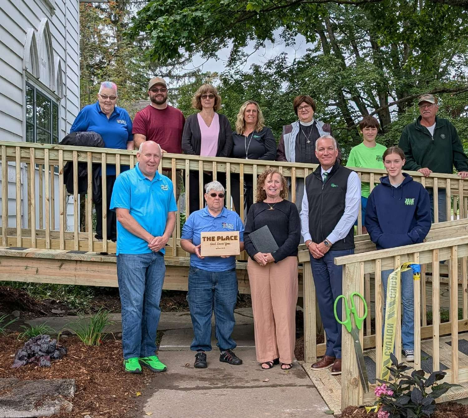 Volunteers building accessibility solutions with The Impact Project that make a lasting difference for local families.