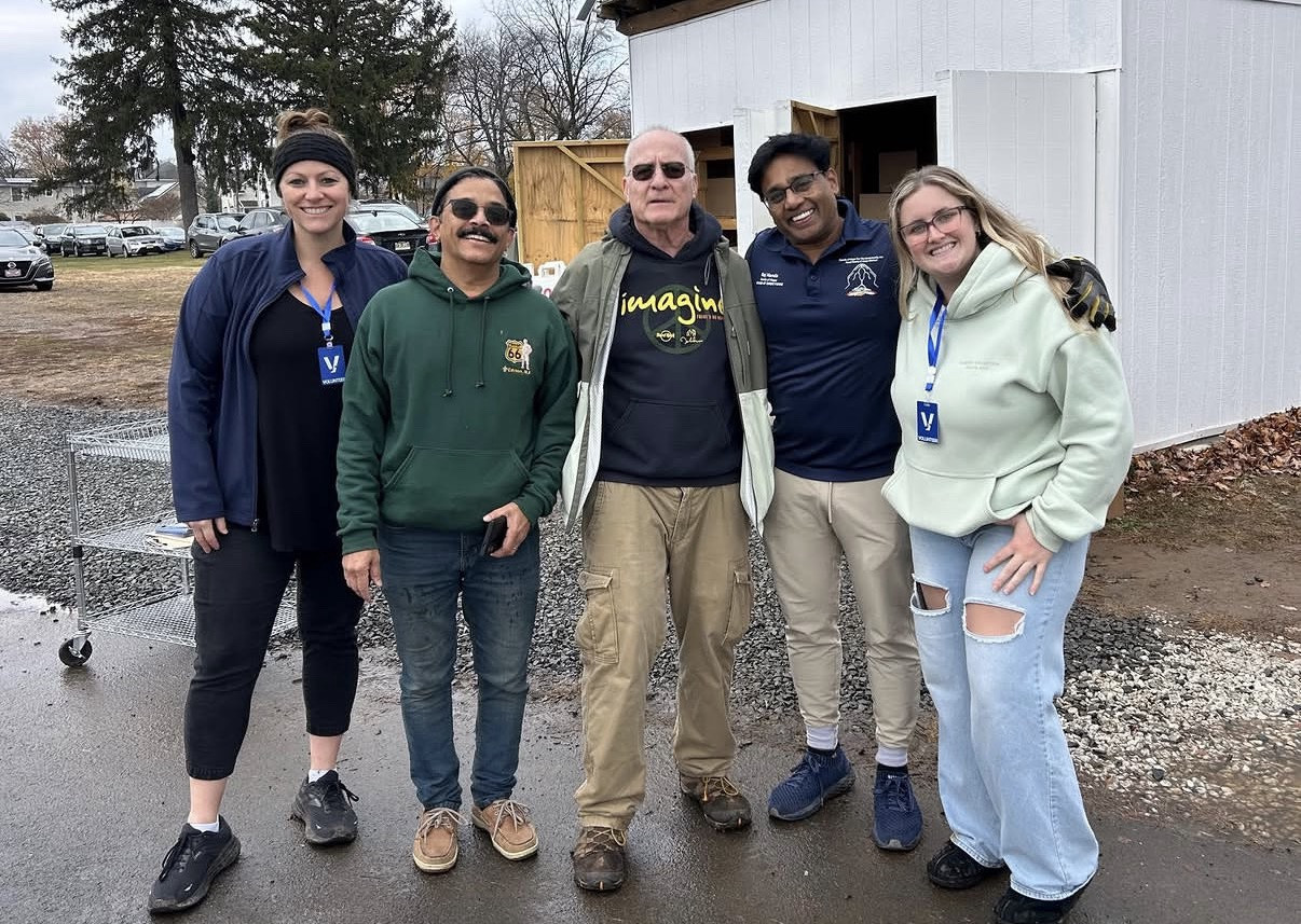 Volunteering with Hands of Hope Food Pantry, helping make a difference for families in the Edison community.