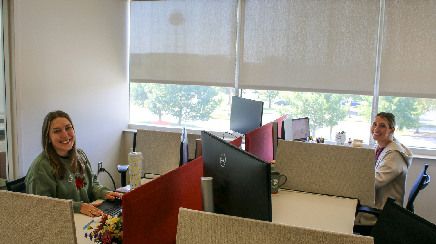 Employees enjoying the new office space for our growing organization!
