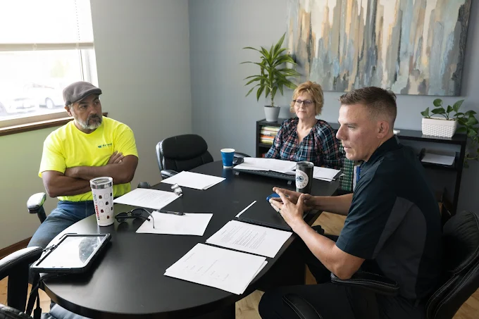 Sharing insights and driving progress during our meetings.