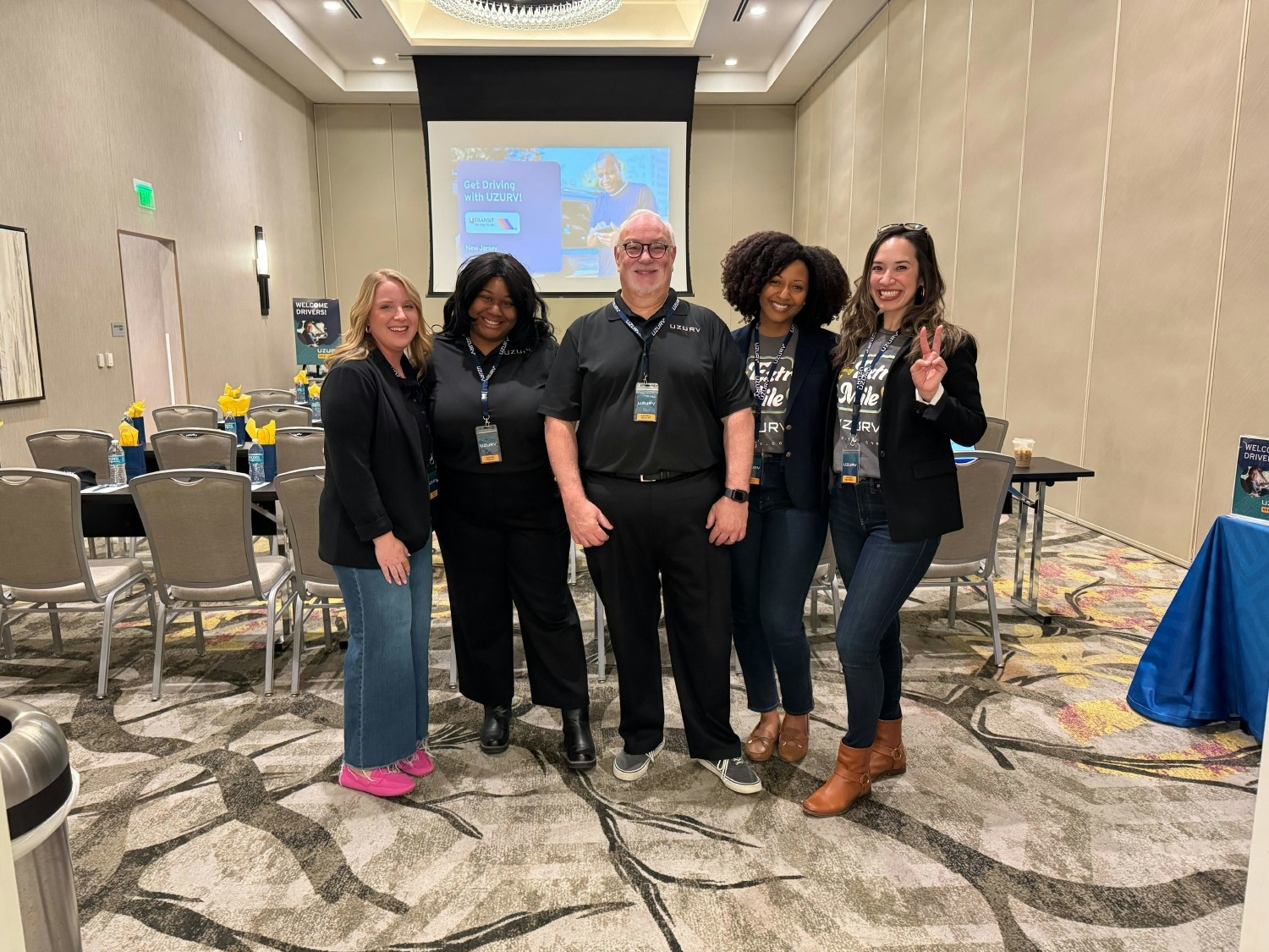 The UZURV Driver Success team gearing up to welcome new drivers at a driver event in one of our new markets.