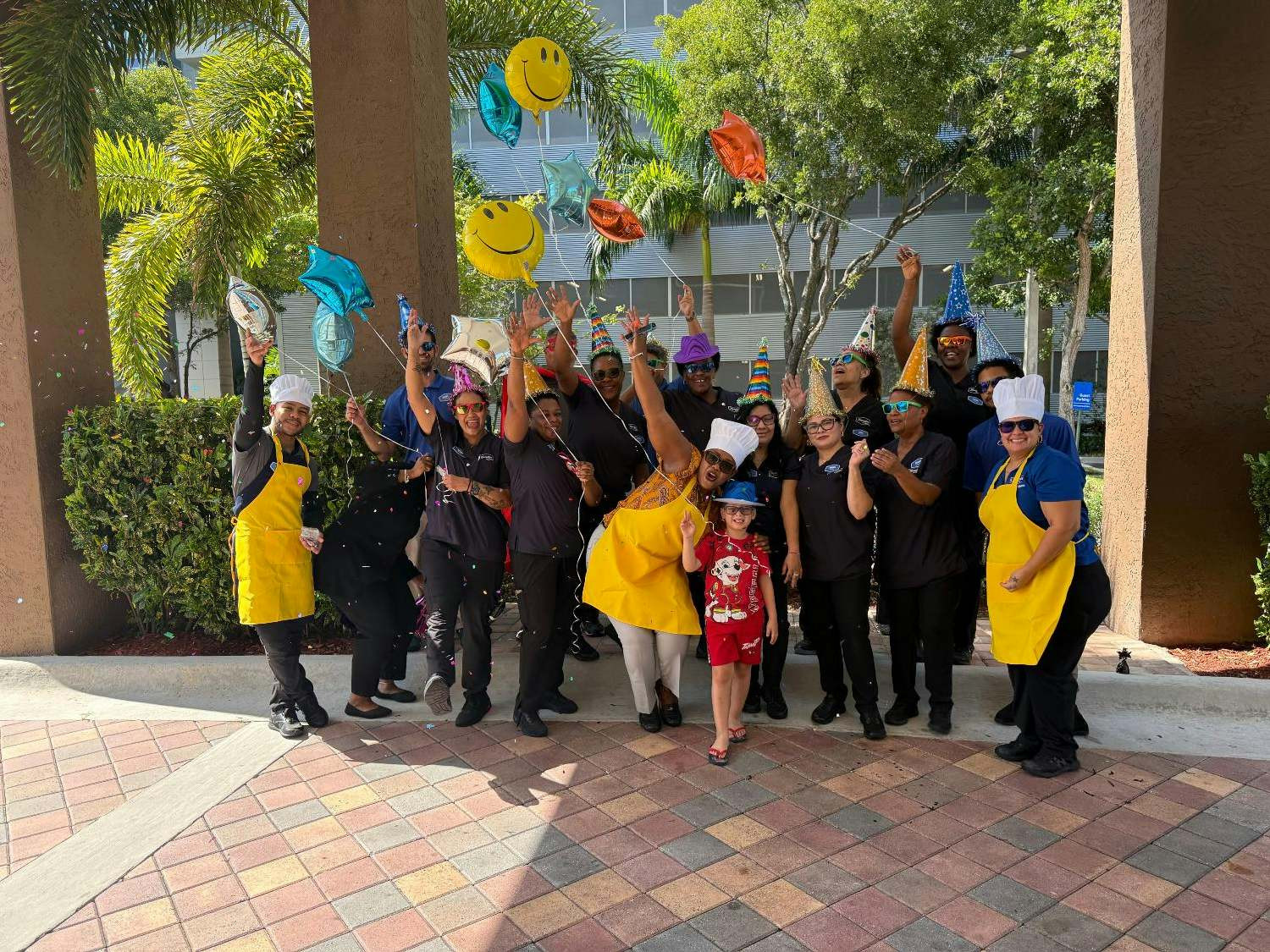 The Hampton by Hilton Hallandale Beach team proudly showing their Hamptonaliity!