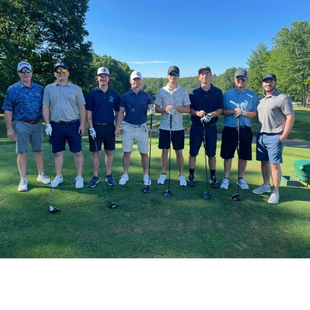 Our owner, Paul, with a crew of team members at a golf outing we attended. 