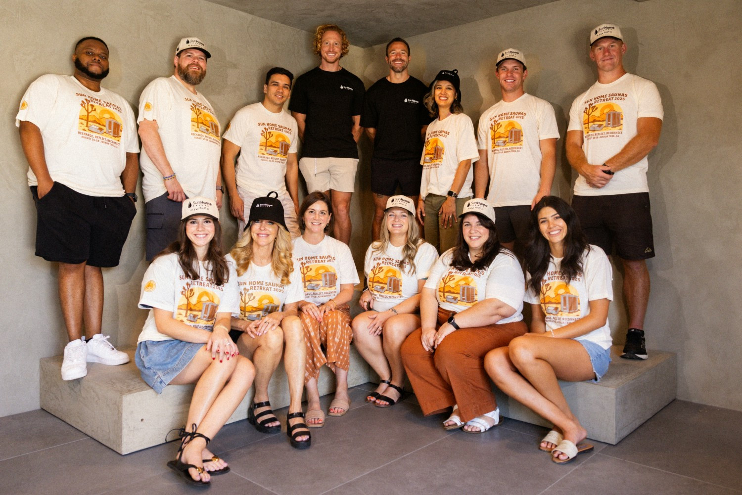 Serious team photo in our retreat shirts and snazzy hats!