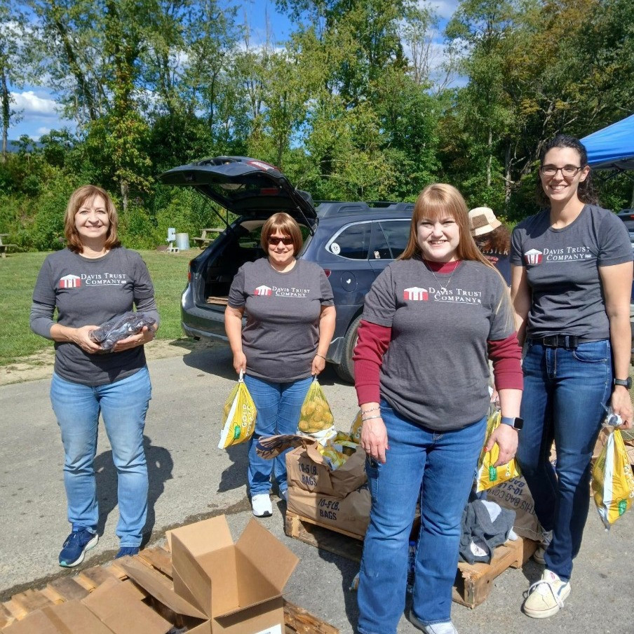 The Davis Trust team volunteers regularly with the Mountaineer Food Bank distributing food to community members.