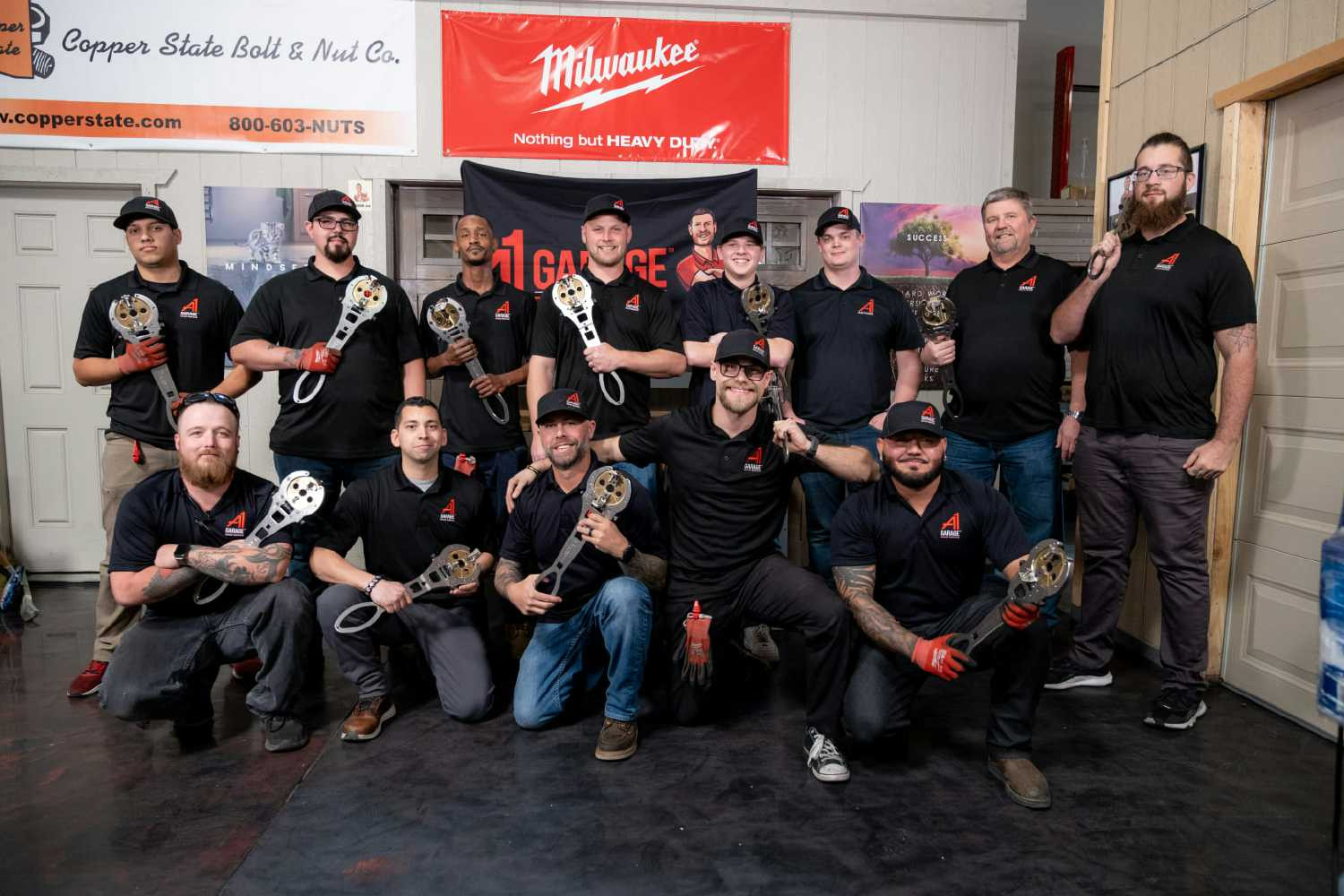 A1 Garage Door Service employees inside the A1 Garage Door Service Training Center in Phoenix.
