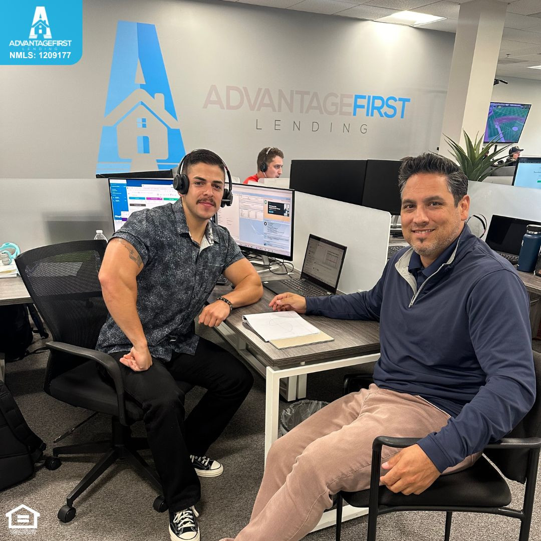 Our Sales Manager, Kevin helping out Senior Loan Officer, Angel